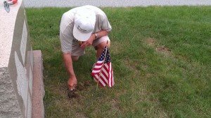 Manual Alvarez at his parents grave