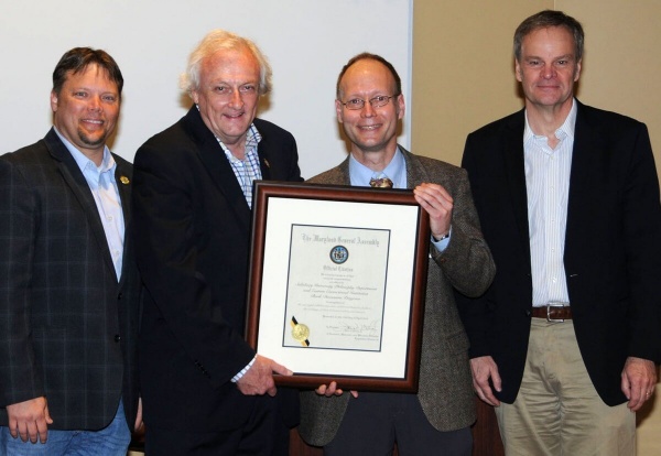 Delegate Carl Anderton; Senator Jim Mathias; Dr. Joerg Tuske, chair of Salisbury University’s Philosophy Department; and Dr. Maarten Pereboom, dean of SU’s Charles R. and Martha N. Fulton School of Liberal Arts.